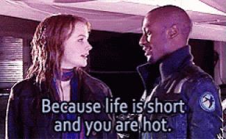 a man and a woman are looking at each other and the woman says because life is short and you are hot .