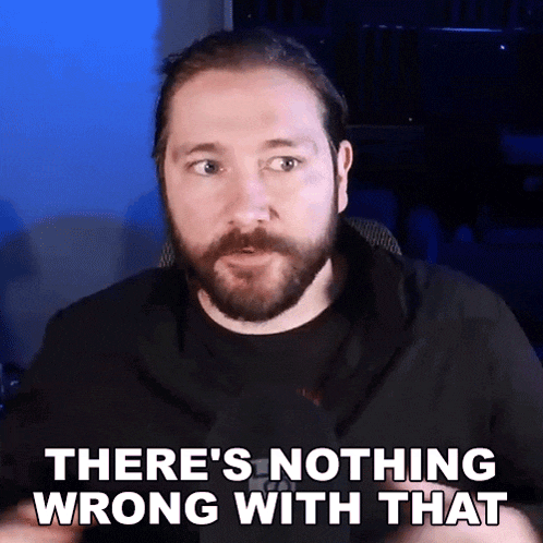 a man with a beard is making a funny face and says there 's nothing wrong with that .