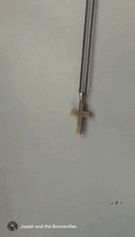 Gold Cross On A Rope Chain Endurance GIF - Gold Cross On A Rope Chain Endurance Endurance Deluxe GIFs