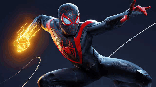 a man in a spider man suit is holding a fireball