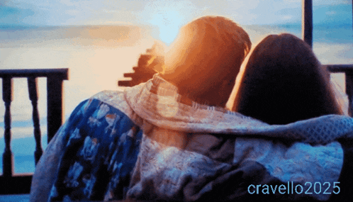a couple sitting on a balcony watching a sunset with the hashtag cravello2025