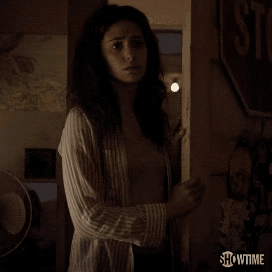a woman standing in a doorway says i love you you know showtime