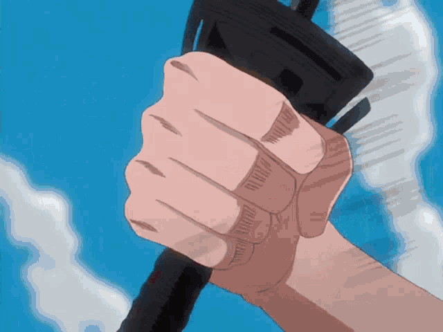 a person holding a sword in their fist