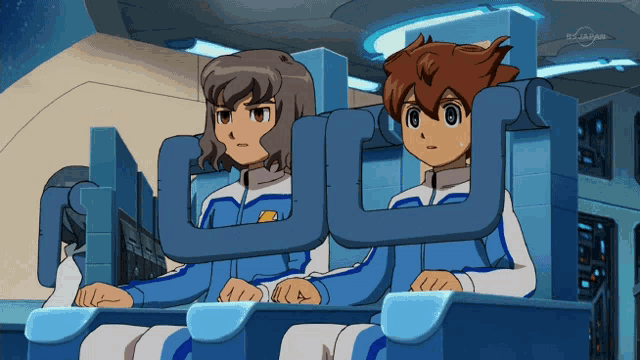 two anime characters are sitting in a chair with the tv channel tokyo