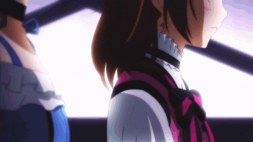 a girl with a ponytail is standing next to a boy