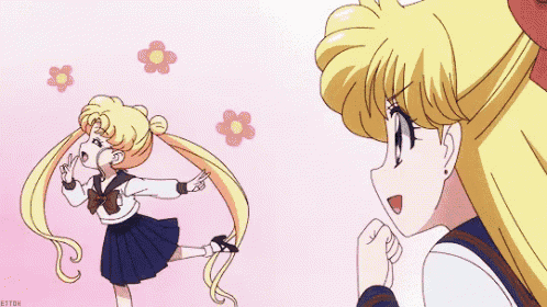 a girl in a sailor suit is standing next to another girl with flowers flying around her