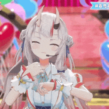 a girl with horns and a microphone on her head