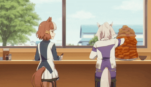 two anime characters are sitting at a table with a plate of food on it