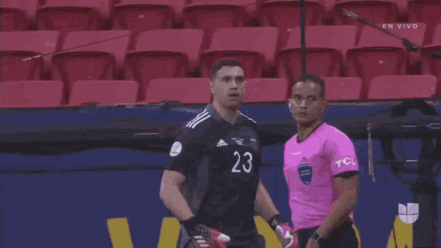 a soccer player with the number 23 on their jersey