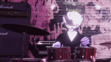 a cat is playing drums in front of a brick wall with a poster that says ravekot