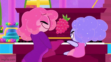 two cartoon characters are playing a piano with a raspberry on it .
