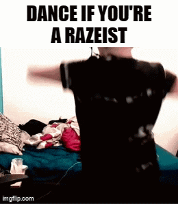 a man is standing in front of a bed with the words dance if you 're a razeist written above him