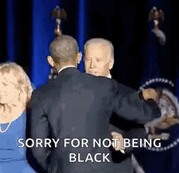 a man in a suit is dancing with a woman in a blue dress .