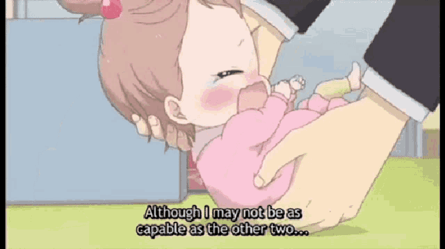 a person is holding a baby in their arms and says although i may not be as capable as the other