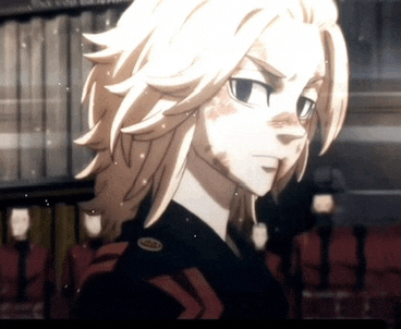 a close up of a person 's face with a badge that says ' tokyo ghoul ' on it .