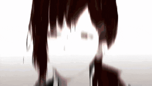 a close up of a person 's face with long hair