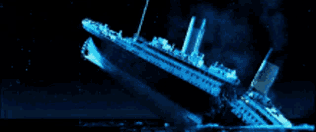 a large ship is sinking in the ocean