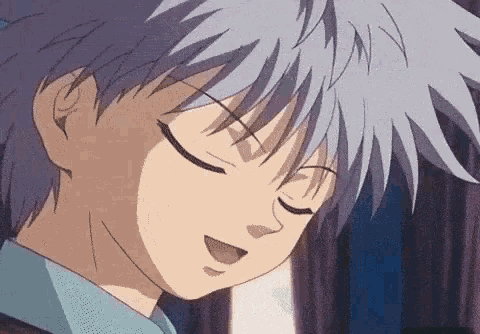a close up of a person with their eyes closed .