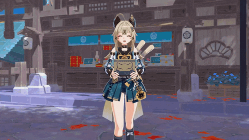 a girl in a blue and gold outfit is holding a box
