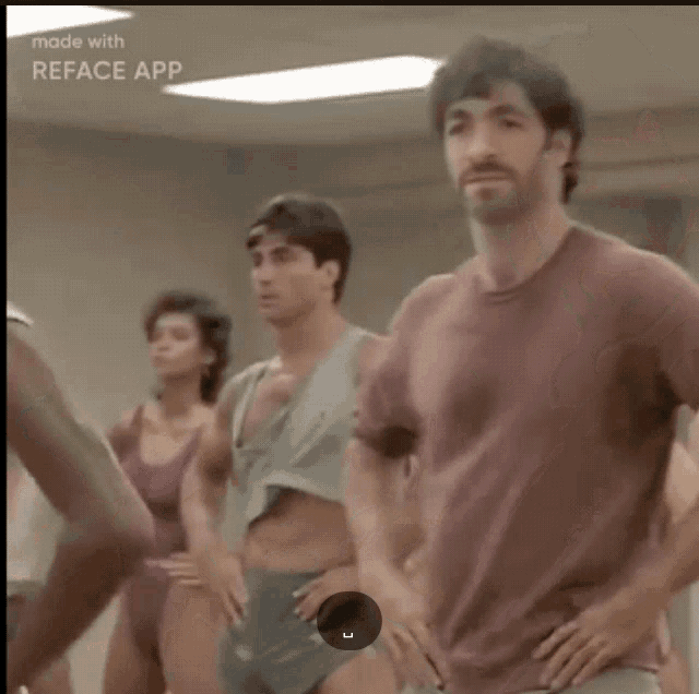 a man with a beard is standing in front of a reface app