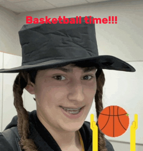 a person wearing a black hat with the words basketball time written on it