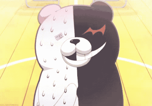 a black and white teddy bear with a red eye