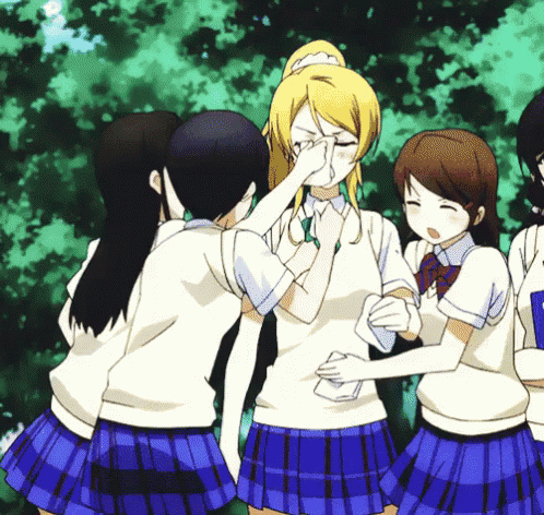 a group of anime girls are standing around a girl covering her eyes