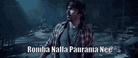 a man in a plaid shirt is pointing at something with the words romba nilla panama nee written below him