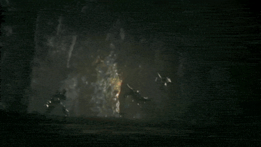 a computer generated image of a robot in a dark room