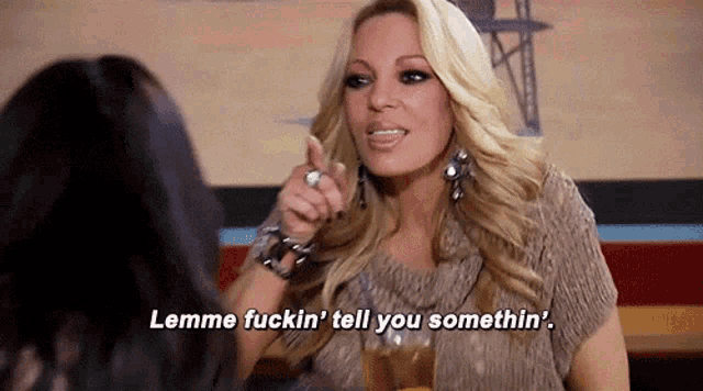a woman is pointing at another woman and says lemme fuckin ' tell you somethin '