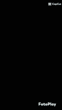 a screen shot of a waterfall with the caption " fotoplay " at the bottom