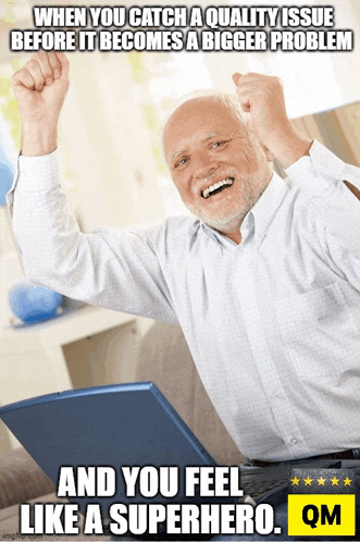 an older man is sitting in front of a laptop with his arms in the air