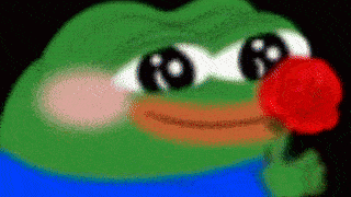 a green frog is holding a red rose in his mouth .
