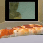 a slice of pepperoni pizza sitting in front of a microwave