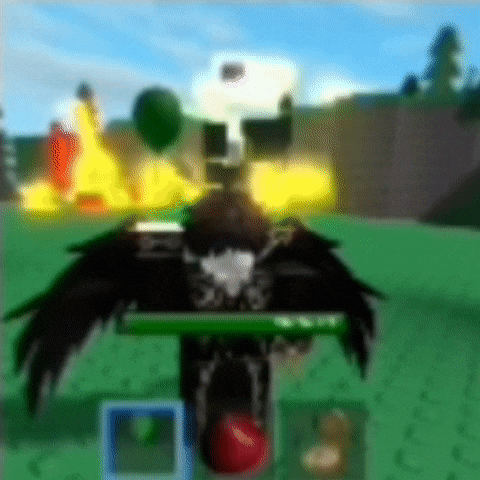 a blurry picture of a person in a video game with a red ball in the middle of a field .