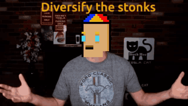 a man wearing a ford classic mustang t-shirt stands in front of a brick wall
