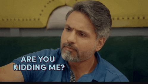 a man with a beard is asking if he is kidding me