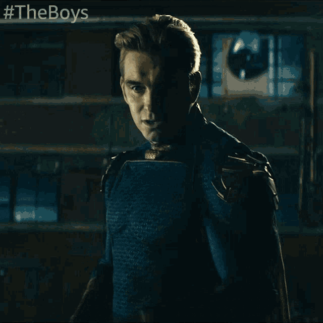 a man in a superhero costume is saying you guys