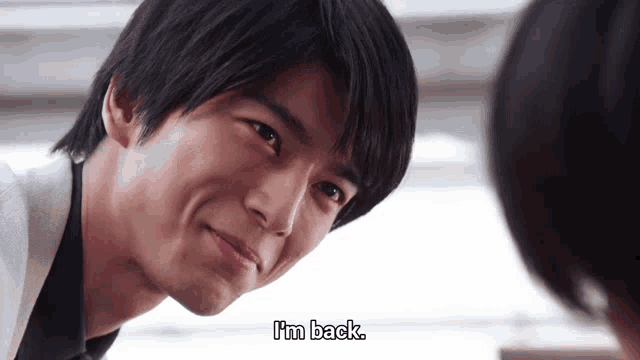 a man says " i 'm back " while looking over his shoulder