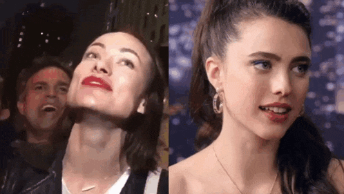 a woman with red lipstick is standing next to a woman with blue eyeliner .