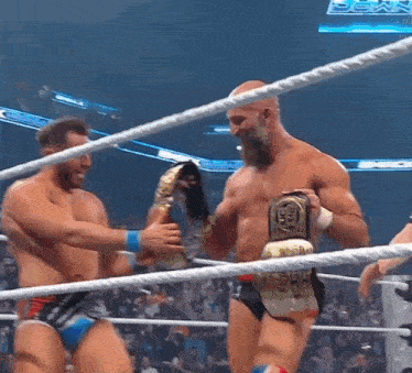 a man in a wrestling ring is wearing a knee brace that says danny on it