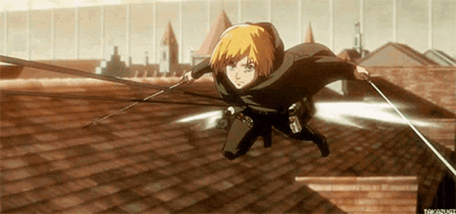 a person is flying through the air holding a sword .