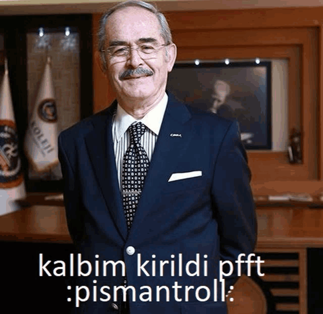 a man in a suit and tie with the words kalbim kirildi pfft pismantroll written below him