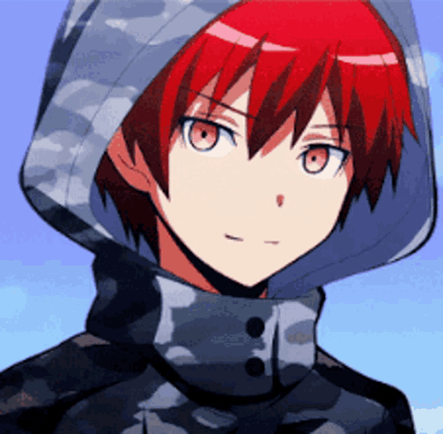 a boy with red hair is wearing a camouflage jacket