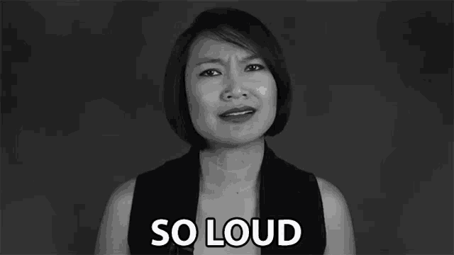 a black and white photo of a woman with the words so loud above her head