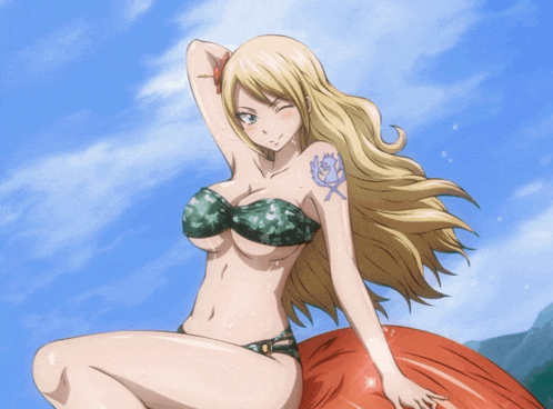 a woman in a bikini has a tattoo on her arm with the letter s on it