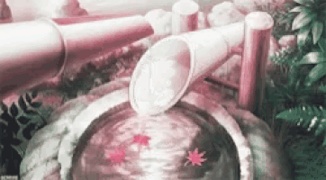 a water fountain with a bamboo pipe pouring water into a pond with leaves in it .