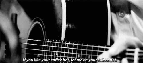 Arctic Monkeys Guitar GIF - Arctic Monkeys Guitar Coffee Hot GIFs