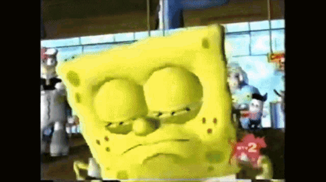 a cartoon spongebob squarepants character with a sad face