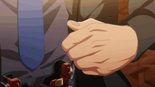 a man in a suit and tie is holding something